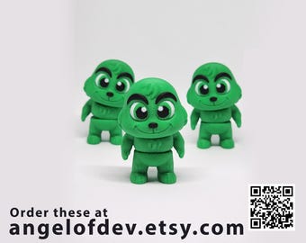 Figura flexible del Grinch: un amuleto navideño con movimiento