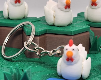 Lindo llavero decorativo articulado con forma de pollito