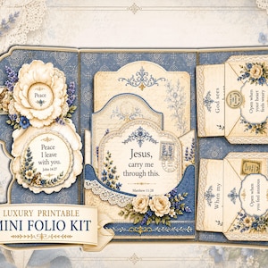 May include: A luxury printable mini folio kit in blue and cream tones. It includes decorative cards, envelopes, and floral details. The text features religious quotes, including "Peace I leave with you" and "Jesus, carry me through this."