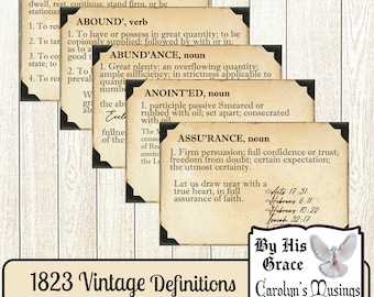 May include: Four vintage-style cards with black borders and cream-colored backgrounds. Each card features a different word in a large, bold font, followed by its definition and a scripture reference. The words are "Abide", "Abound", "Anointed", and "Assurance". The cards are set against a woodgrain background. The text at the bottom of the image reads "1823 Vintage Definitions By His Grace Carolyn's Musings".