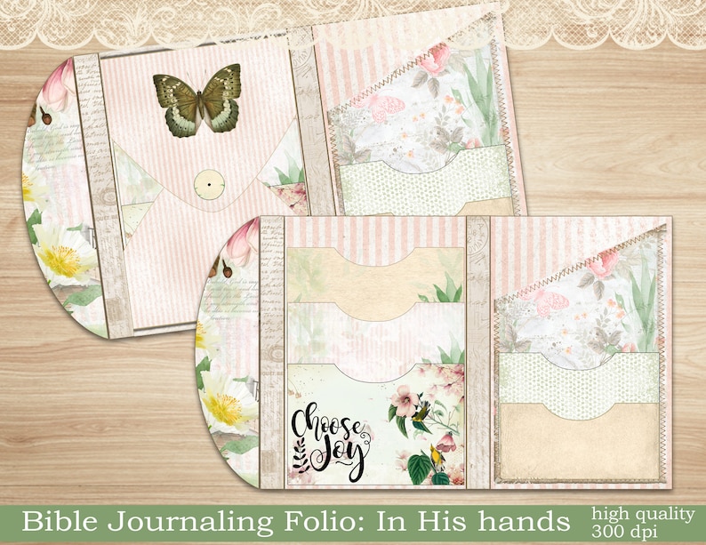 May include: A pink and green Bible journaling folio with pockets and a butterfly design. The folio has the text "Choose Joy" on the front.
