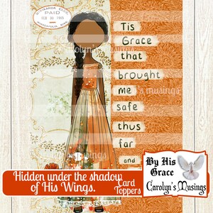 May include: A digital printable card topper featuring a cartoon girl in a long orange dress with a floral pattern. The text "Tis Grace that brought me safe thus far and By His Grace Carolyn's Musings" is on the right side of the image. The text "Hidden under the shadow of His Wings. Card Toppers" is at the bottom of the image.
