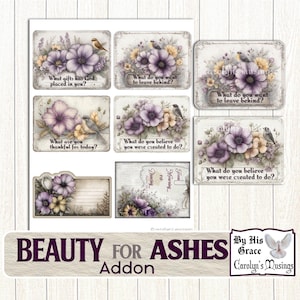 May include: A sheet of decorative paper with floral designs and inspirational quotes. The designs feature purple and yellow flowers, birds, and text such as "What gifts has God placed in you?" and "Beauty for Ashes Addon."