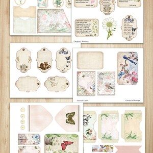 May include: A printable Bible journaling folio with a floral and butterfly theme. The folio includes tags, journal cards, and envelopes with quotes from the Bible. The text includes "In His Hands" and "Four thou not for I am with thee, be not dismayed for I am thy God, I will strengthen thee, I will help thee, yea, I will uphold thee with the right hand of my righteousness."