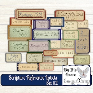 May include: A collection of vintage-style Scripture Reference Labels, featuring various Bible verses like Romans 15:18 and Jeremiah 29:11. The labels have a distressed look with decorative borders and text in elegant fonts. The set includes a dark blue banner with the text "Scripture Reference Labels Set #2".