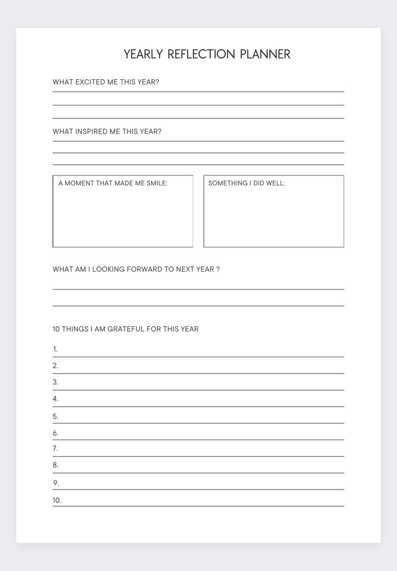 May include: A printable yearly reflection planner with prompts for reflecting on the past year and setting goals for the next year. The prompts include: What excited me this year? What inspired me this year? A moment that made me smile: Something I did well: What am I looking forward to next year? 10 things I am grateful for this year.