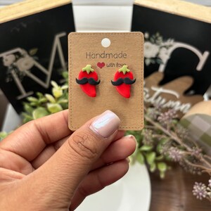 Red Chille pepper with a mustache Stud. Fun and Festive!