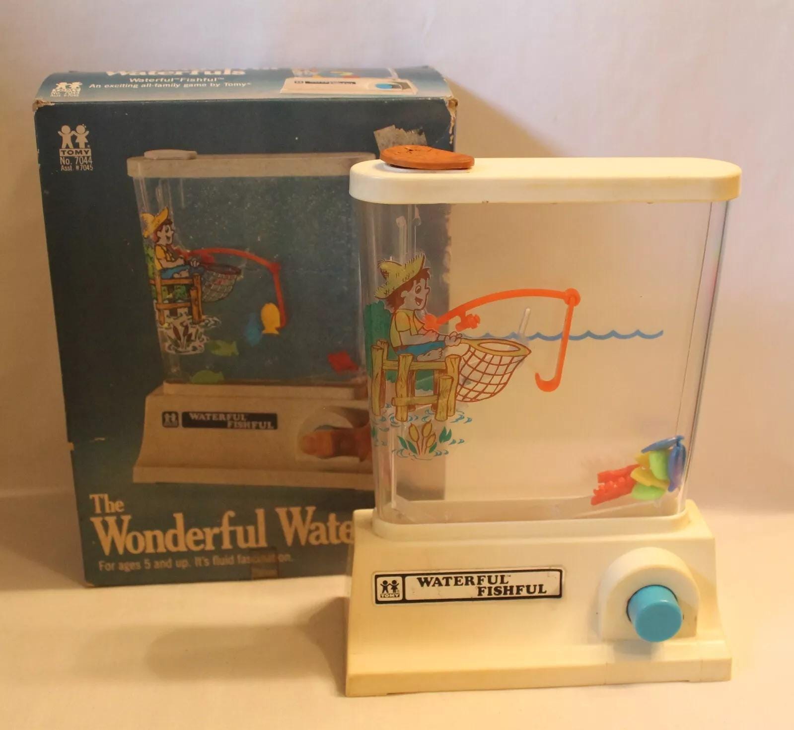 TOMY Fun Water Games, Dolphin : Amazon.co.uk: Toys & Games