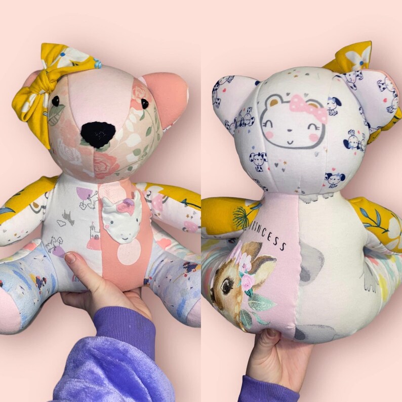 May include: Two handmade teddy bears. One bear has a yellow bow, pink ears, and a floral pattern on its head. The other bear has a white head with a bear face and a pink bow. Both bears have a patchwork design with various patterns and colours.