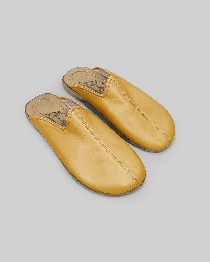 Main view of handmade mustard leather mules for men, showcasing the wide toe box and premium artisan craftsmanship for natural barefoot comfort.