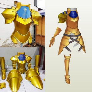 May include: A gold-colored armor set with a blue chest plate featuring a cross. The armor is made up of separate pieces, including a chest plate, shoulder pads, arm guards, leg guards, and a skirt. The armor is displayed on a white background.