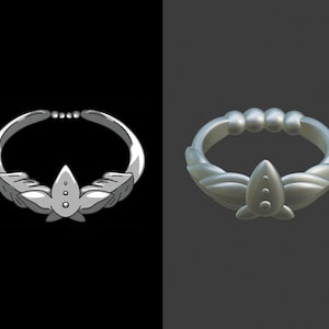 May include: A silver ring with a stylized flower design. The ring has three small round stones in the center of the flower.