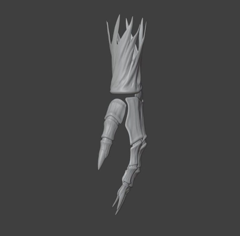 May include: A 3D-rendered, gray skeletal hand with sharp, claw-like fingers. The wrist area has a textured, organic appearance, and the fingers are segmented. The hand is set against a dark gray background.