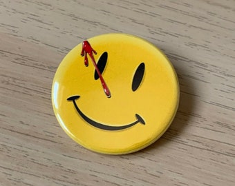 Spilla Watchmen con bottone posteriore da 38 mm con faccina sorridente