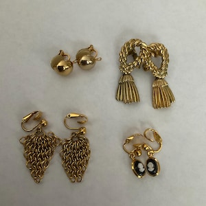 Four Pairs Of Vintage Gold Tone Clip On Earrings