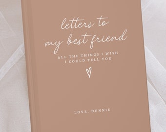 May include: A tan journal with the words "letters to my best friend" in white script. Beneath, it reads "All the things I wish I could tell you" with a heart symbol. The journal is signed "Love, Donnie".