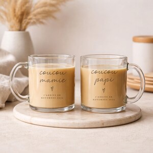 May include: A set of three ceramic mugs with a speckled, matte finish. The mugs are in shades of cream, light brown, and dark brown. Each mug has a simple, minimalist design, perfect for coffee or tea.