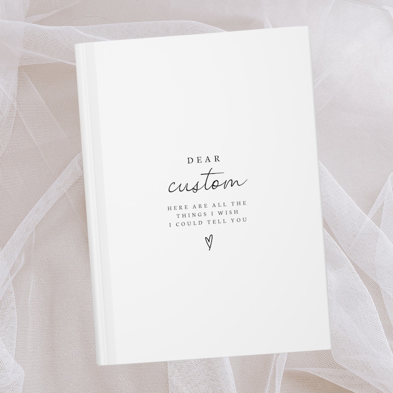 May include: White journal with the text "DEAR custom HERE ARE ALL THE THINGS I WISH I COULD TELL YOU" and a small heart symbol.