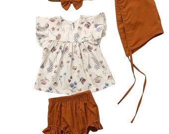 Babymeisje schattige herfst fotoshoot romper blouse hoofdband en hoed outfit babyfoto's