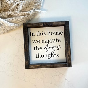 In this house we narrate the dogs thoughts, wood sign.