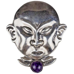 Broche circulaire visage/masque mexicaine des années 30 en argent avec cabochon en améthyste