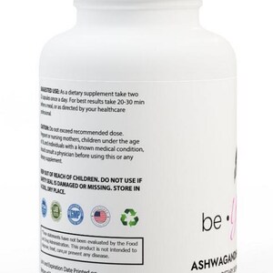 May include: White plastic bottle with a black and pink label that says "be. you" and "ASHWAGANDHA DIETARY SUPPLEMENT". The bottle has a white cap and a label with instructions for use and warnings.