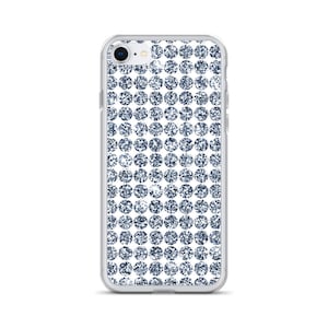 May include: A clear phone case with a silver glitter pattern. The glitter is arranged in a repeating circle pattern.