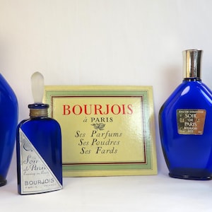 Set mit 4 leeren Parfümflaschen von Bourjois Soir de Paris + einer Werbekarte