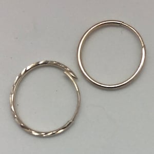 Sterling silver sleeper hoop earrings. Solid hoops diamond cut pattern