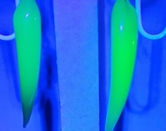 Unique handmade earrings using vintage uranium glass and elements of recycled jewelry