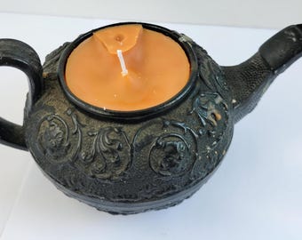 Hand poured and blended citronella candle in a vintage black ceramic teapot