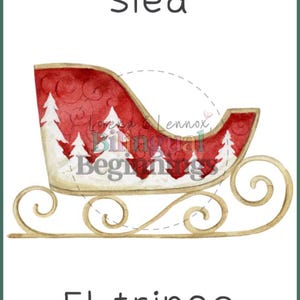 May include: A red and white sled with a gold metal frame. The sled is decorated with a wintery forest scene. The text "Sled" is written above the sled and "El trineo" is written below the sled.