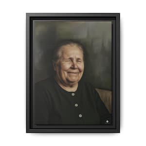 May include: A framed canvas print featuring a portrait of an elderly person smiling with their eyes closed. The person is wearing a dark button-down shirt. The background is a muted green and brown.