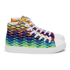 May include: White high-top sneakers with a colorful abstract pattern of blue, green, yellow, orange, and purple.