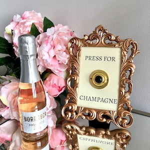 Press for Champagne bell sign decor