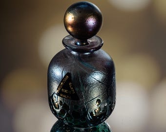 Phoenician Glass - Iridescent bottle - Height 9.5 cm - Malta 1975 - 1999
