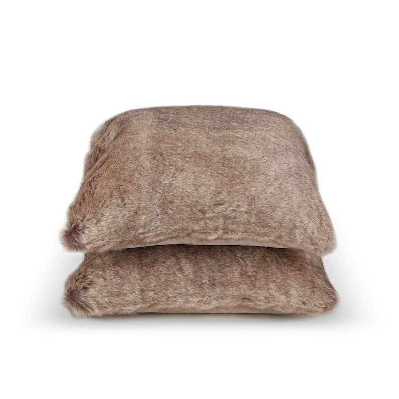 Luxurious set of decorative faux fur pillows in shades of beige, a must-have for your home decor collection. These elegant accent cushions exude comfort and style while adding a refined touch to any interior design. Crafted from delicate faux fur,  ideal for Scandinavian, boho, and classic styles, these decorative pillows bring exceptional design and elegance to your sofa, bed, or armchair.