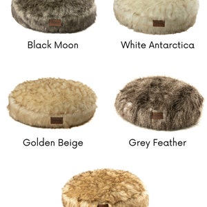 May include: Five round pet beds in different colors and faux fur textures. The colors are Black Moon, White Antarctica, Golden Beige, Grey Feather, and Royal Brown.