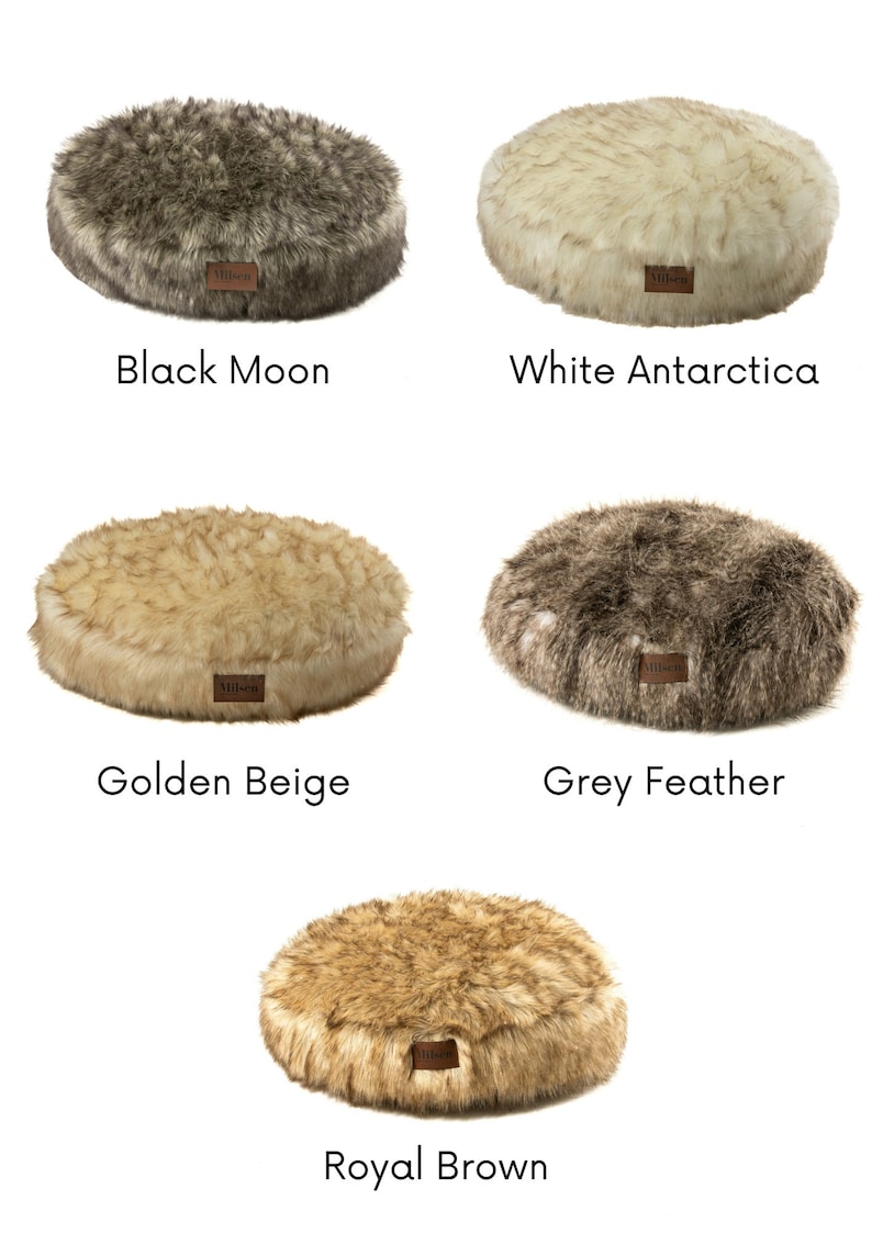 May include: Five round pet beds in different colors and faux fur textures. The colors are Black Moon, White Antarctica, Golden Beige, Grey Feather, and Royal Brown.