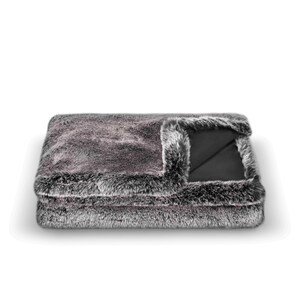 Luxurious faux fur throw is an ideal addition to home decor, seamlessly blending comfort and elegance. Crafted from soft, high-quality synthetic fur in sophisticated gray tones, this blanket perfectly complements modern interiors, recessed spaces, and designer home decorations. Its exceptional plush texture and cozy warmth transform any room into a stylish haven of relaxation.