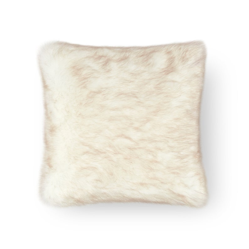 Add luxury and elegance to your home décor with this exclusive cream pillow crafted from high-quality faux fur. Perfectly paired with modern blankets and stylish accents, it creates exceptional comfort and refined interior design. Ideal for the living room, bedroom, or lounge, this statement piece enhances the ambience of glamorous, boho, or Scandinavian spaces.