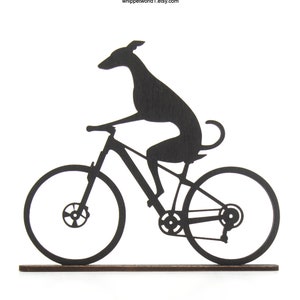 Whippet Greyhound riding a motorbike scooter or bicycle silhouette ornament. Gift for whippet lover. TV topper. Painted black or oak stain. Design 6