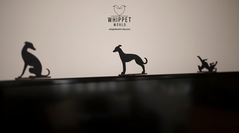 May include: A set of three ceramic mugs with a speckled, matte finish. The mugs are in shades of cream, light gray, and dark gray. Each mug has a simple, minimalist design, perfect for coffee or tea.