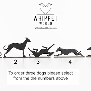 May include: Black metal whippet dog silhouettes in various poses, numbered 1 through 5. The silhouettes are mounted on a wooden base. The text "WHIPPET WORLD" and a website address are at the top, with instructions below.