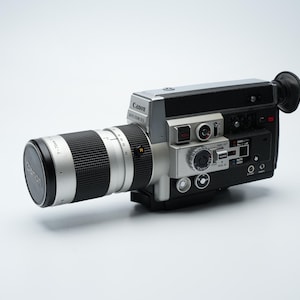 Canon Auto Zoom 1014 Super 8 Camera – f/1.4 7–70mm Lens, Fully Working – Pro-Level Vintage Film Gear (1970s Japan)
