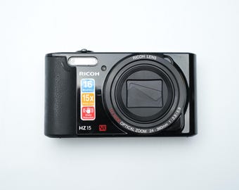 Ricoh HZ15 Digital Camera – Black, 16MP CCD, 15x Zoom 24–360mm, HD Video, Shake Reduction