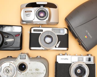Add a Touch of Nostalgia to Your Home with this Collection of 6 Defective Vintage Cameras