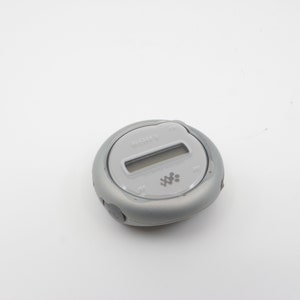 Sony NW-E107 Network Walkman, vintage mini MP3 player, tested digital audio device, portable retro music player