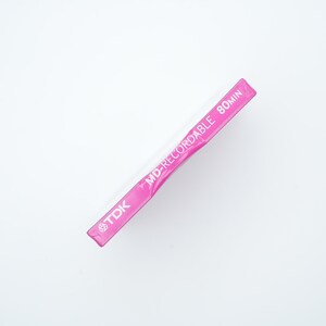 May include: A pink TDK MD-Recordable 80min mini disc.