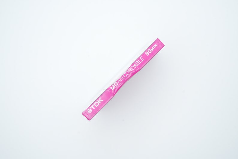 May include: A pink TDK MD-Recordable 80min mini disc.